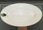 A louça branca da porcelana ajusta o peso redondo 150g do diâmetro 25cm da placa da borda larga